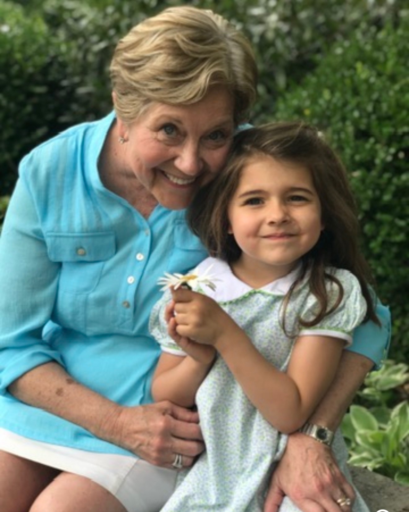 Paige Evans’s mother sharing a warm moment with a young family member